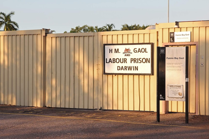 A photo of the entrance of the Fannie Bay Gaol at sunset.