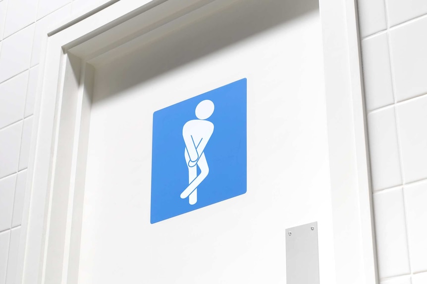 A toilet door with the stick figure crossing legs as if desperate for the toilet.