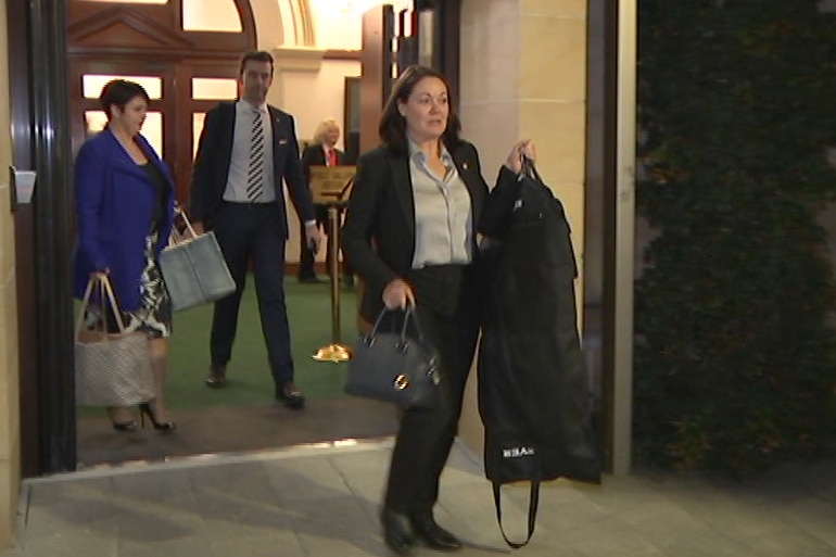 Liza Harvey leaving Parliament go attend an Eagles match.