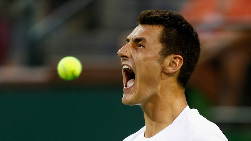 Hungry for success ... Bernard Tomic celebrates defeating countryman Thanasi Kokkinakis