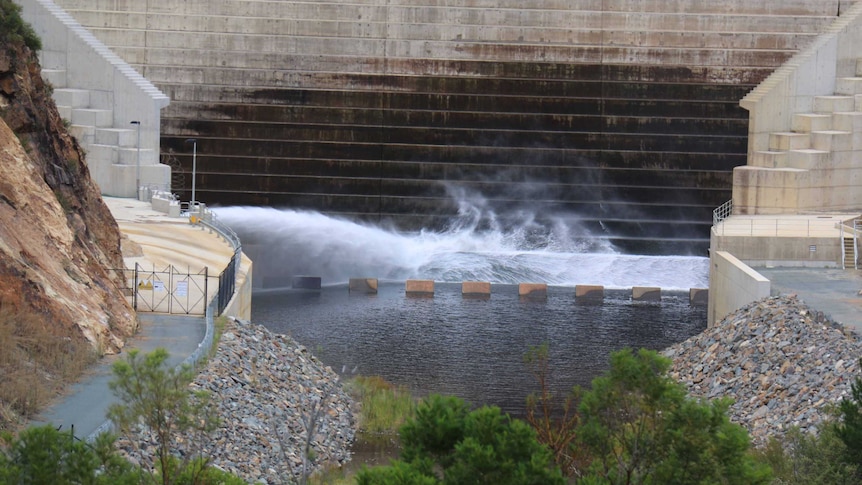 Close up of water being released from Cotter Dam