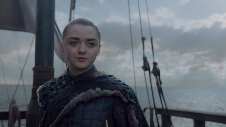 Arya sails away on a boat.