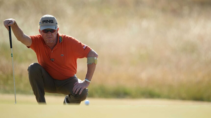 Spain's Miguel Angel Jimenez lines up a putt in the second round of the British Open at Muirfield.