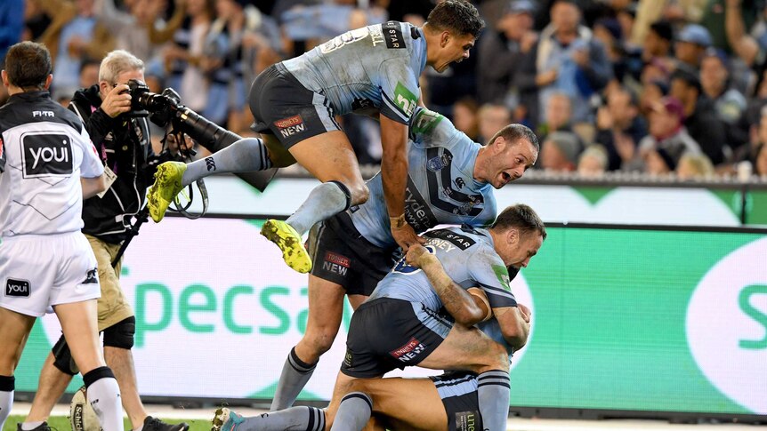 New South Wales celebrate a try