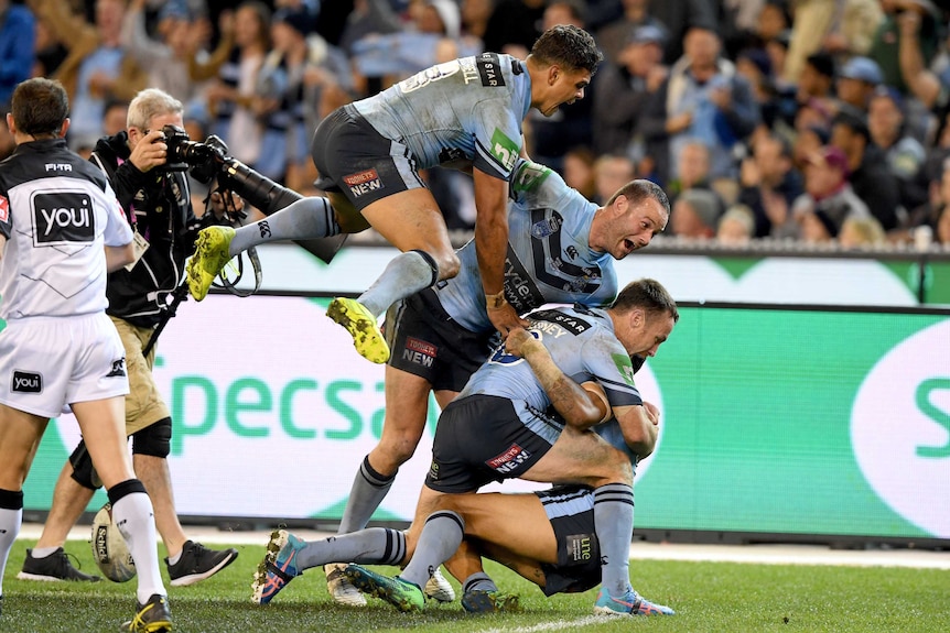New South Wales celebrate a try