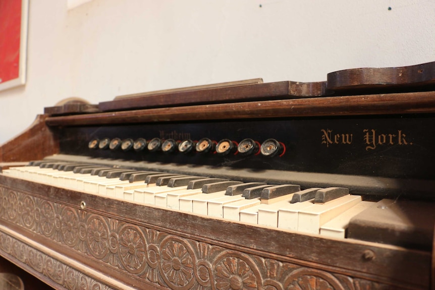 An antique organ inside the historic St James's Anglican Church at Wilcannia.