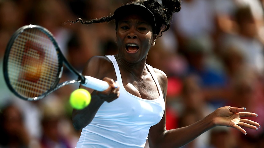 American Venus Williams hits a forehand against Ana Ivanovic in Auckland.