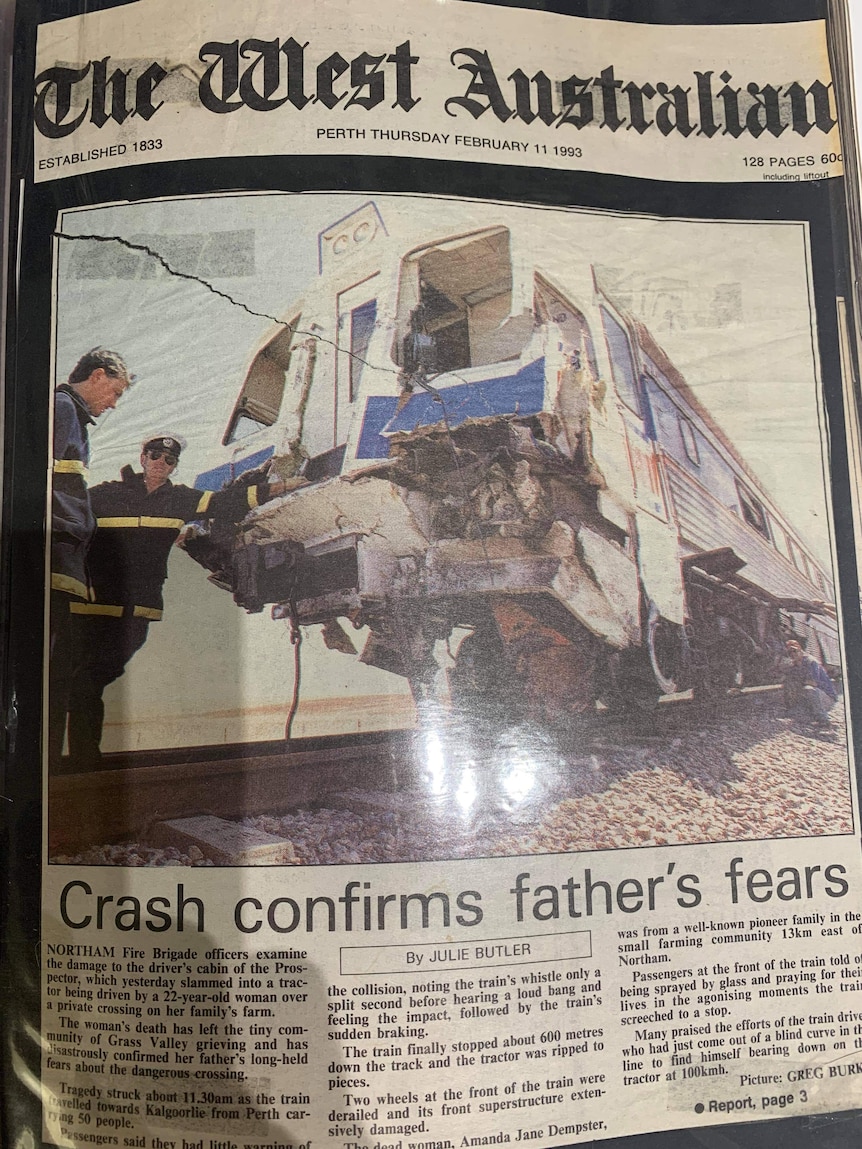 The front page of The West Australian newspaper shows a train which was damaged after a crash.