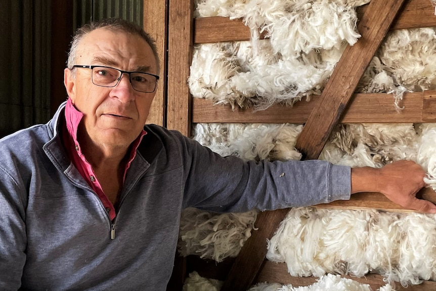 Man sitting with wool.