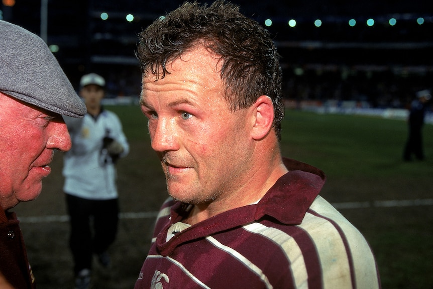 A man is celebrated after a Queensland Origin victory