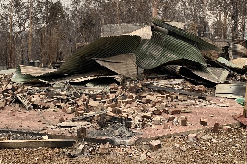 A destroyed small brick house.