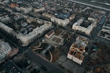 An aerial view of Bakhmut shows damaged and smouldering buildings.
