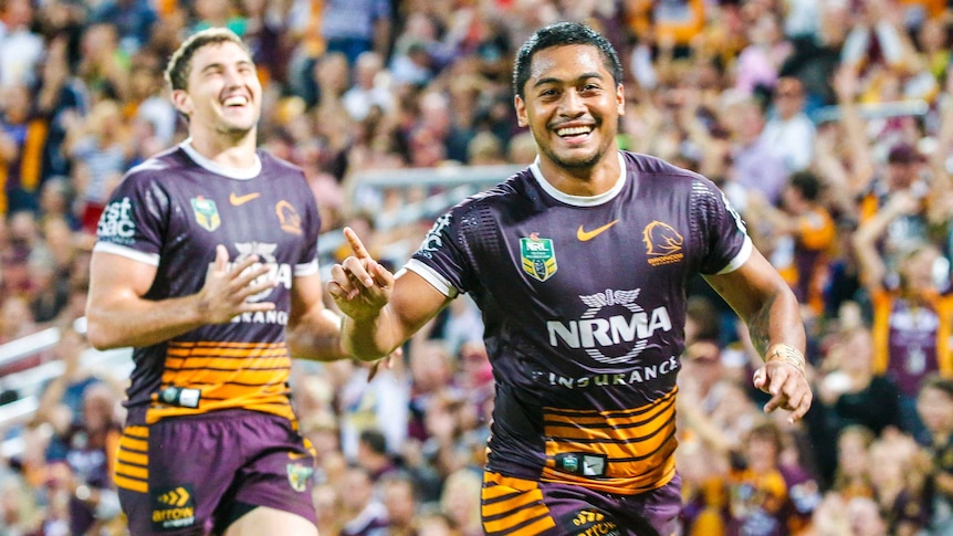 Anthony Milford salutes after scoring a try