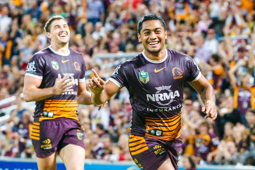 Anthony Milford salutes after scoring a try