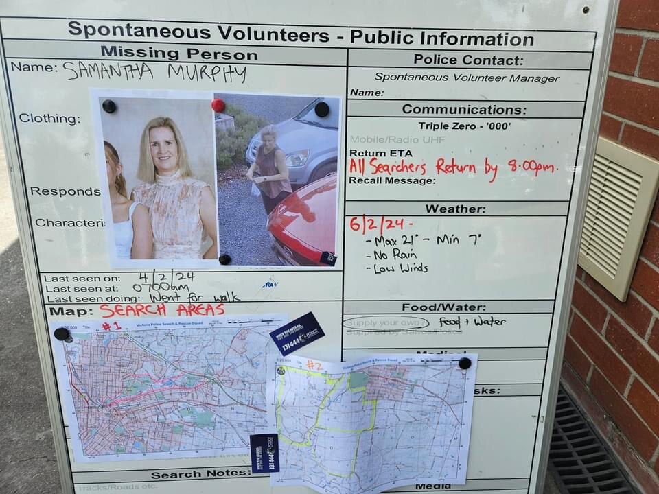 A notice board with maps, photos and information. 