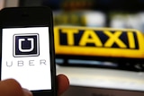 Uber and taxi logos