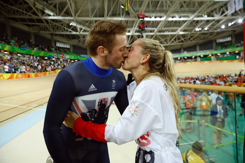 Laura Trott and Jason Kenny kiss at the Rio Olympic Velodrome.