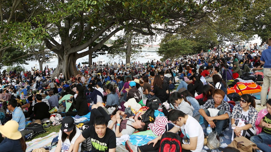 Crowds gather for New Year's Eve fireworks