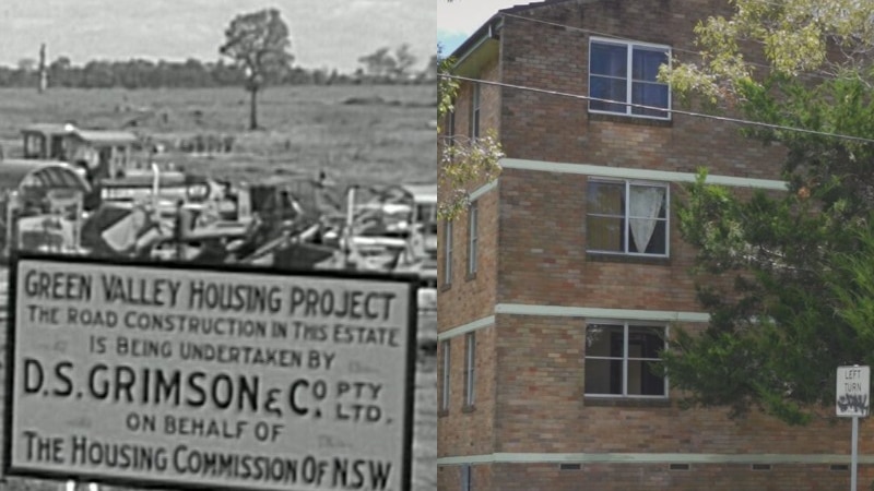 a billboard in black and white and a block of brown brick units