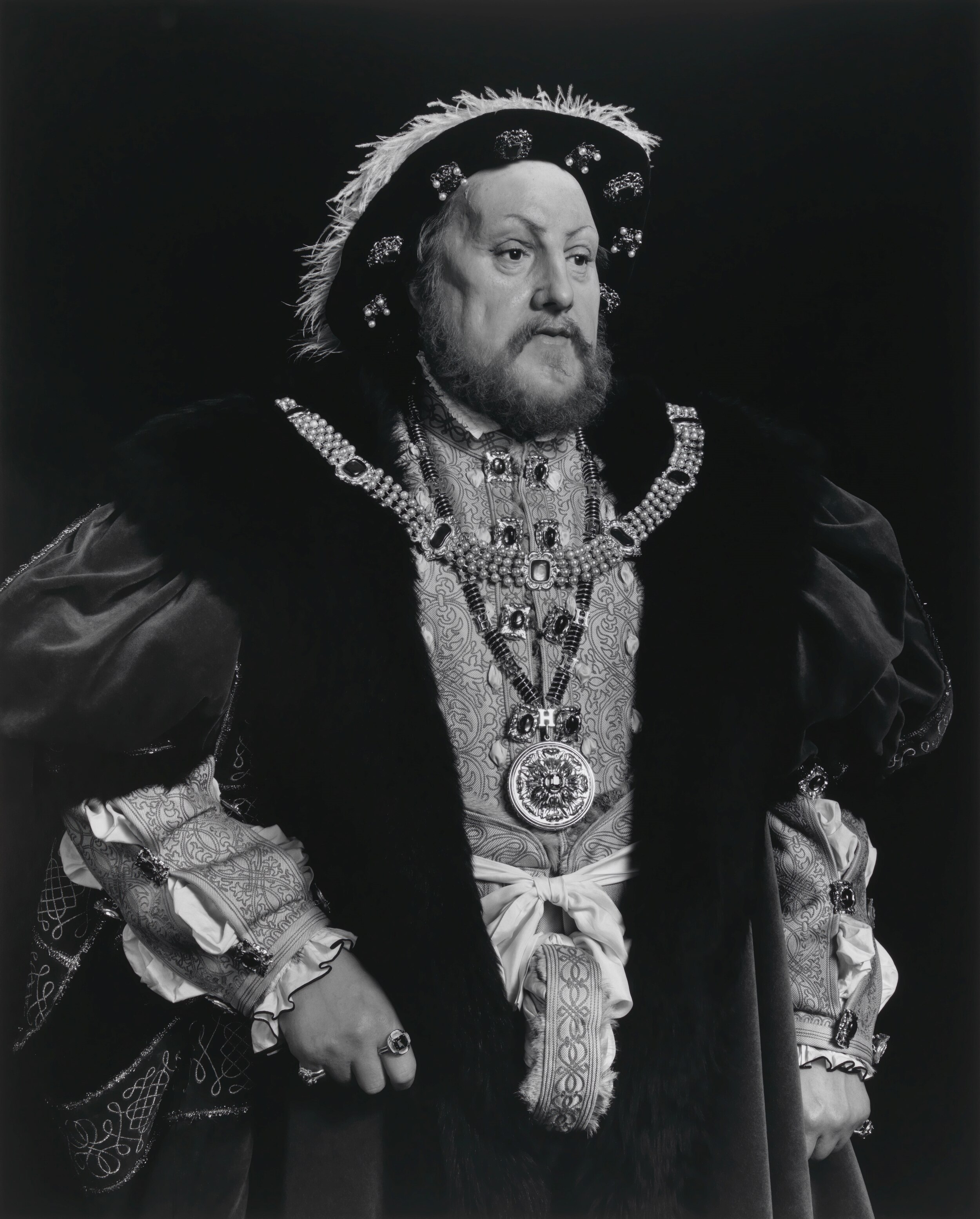 A black and white photograph of a wax figure of Henry VIII