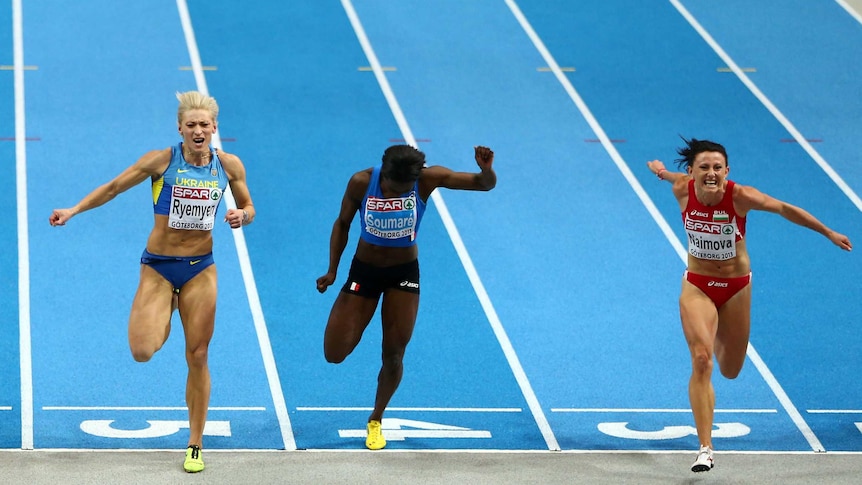 Gold medallist Tezdzhan Naimova (R) wins the women's 60m at the 2013 European Indoor titles.