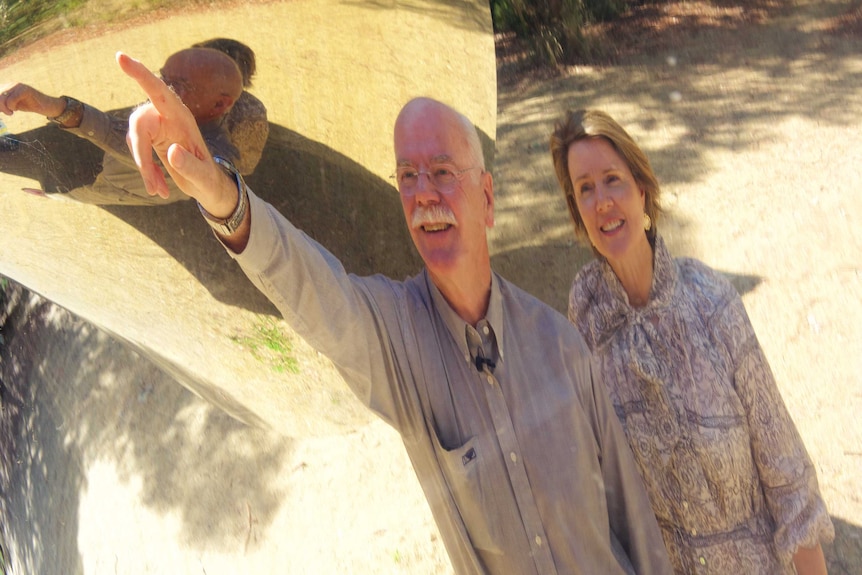 Curious Canberran Terry Hodge and NGA curator Lara Nicholls at another Flugelman sculpture, Cones.