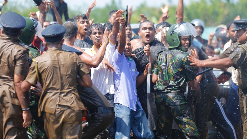 Sri Lankan villagers clash with police officers