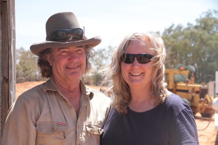 Michelle and Jim O'Connor of Milpa Station stand together on their property