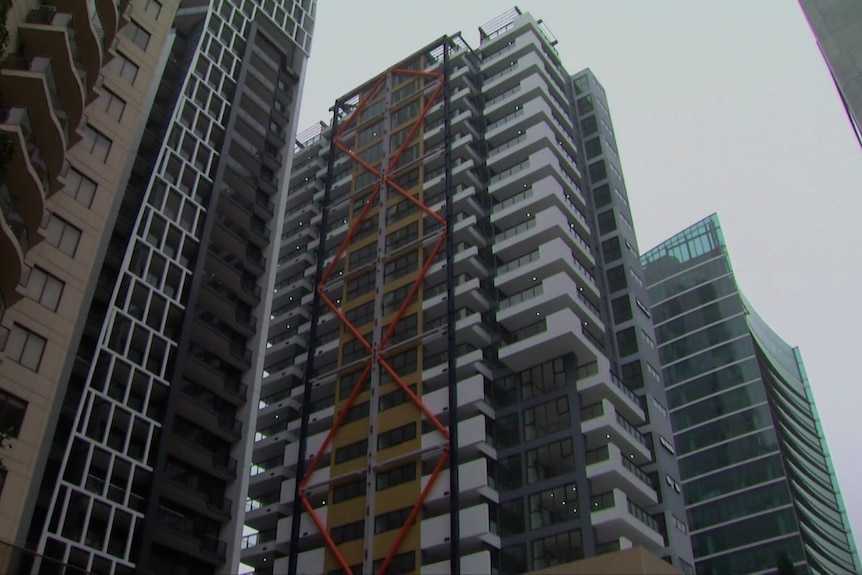 The exterior of a high-rise apartment building.