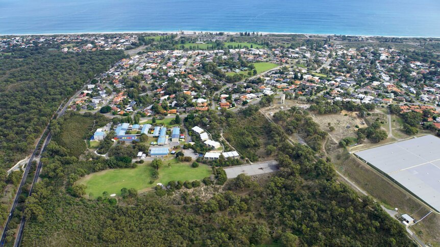 An aerial shot of the old City Beach high school site, showing how close it is to the ocean.