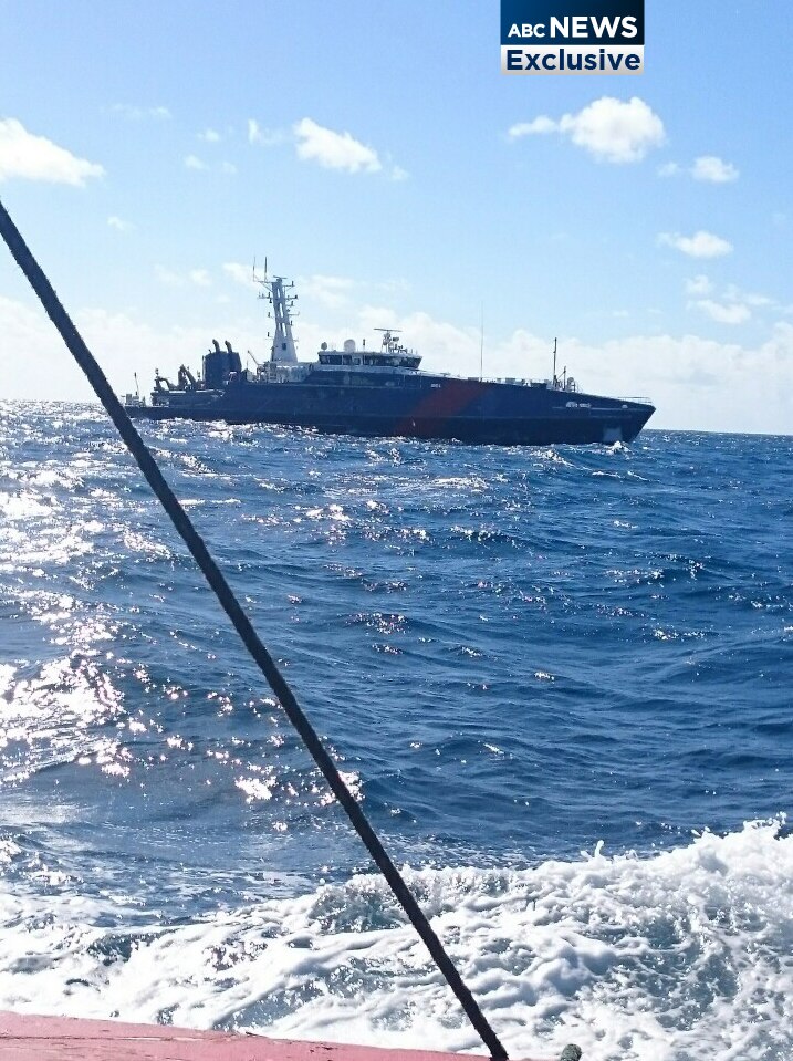 Australian Customs boat approaches an asylum seeker boat