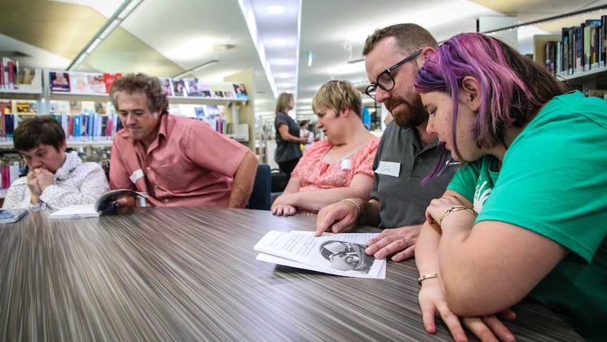 (Left to right) Annie, Rob, Kylie, Chris and Lauren with one of the prescribed books.