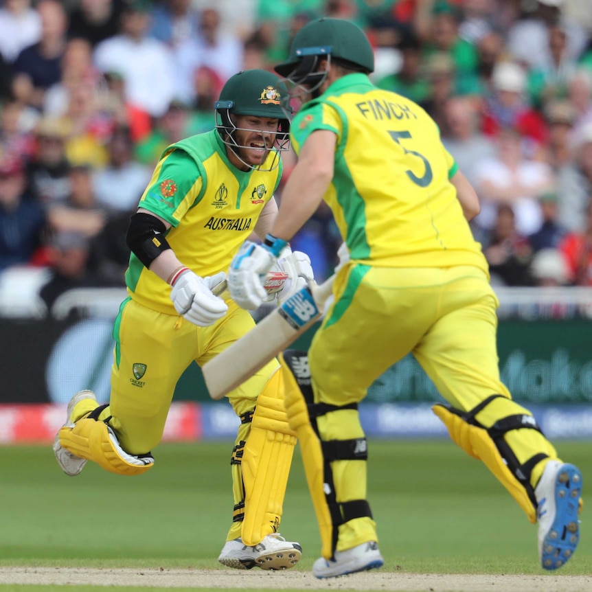 A batsman calls out as he and his partner run between the wickets.