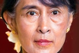 A close up of Aung San Suu Kyi's face