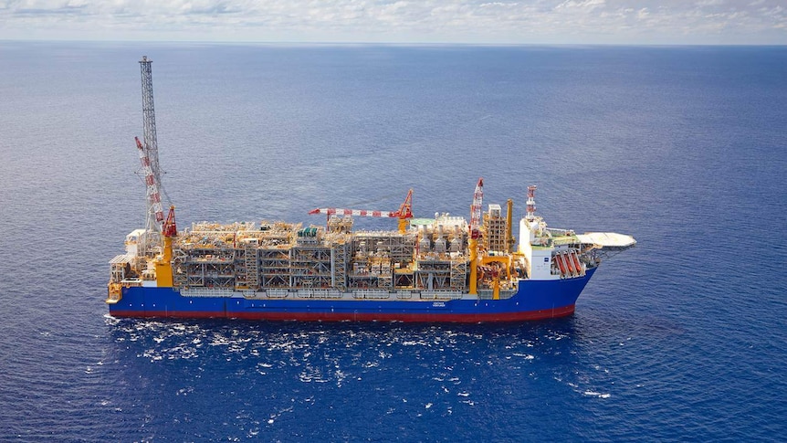 A large cargo ship carrying condensate in the ocean.