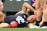 Chris Judd in agony after injurying knee
