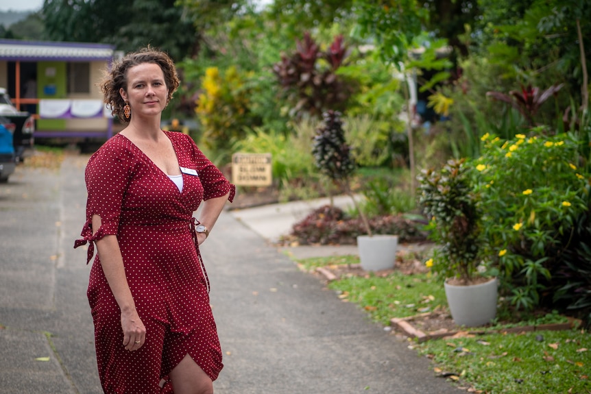 Erica Mast stands in a driveway near a garden in Mossman, Queensland, September 2021.