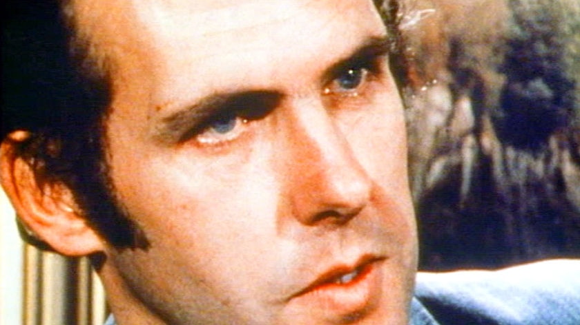 A close up of Bob Brown's face looking stern
