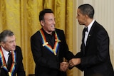 US President Barack Obama greets Bruce Springsteen