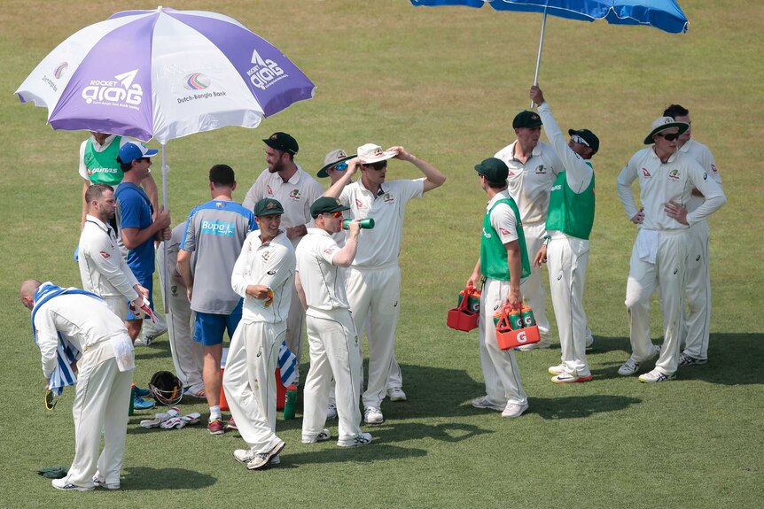 Australian players chatting to each other during a drinks break in Chittagong.