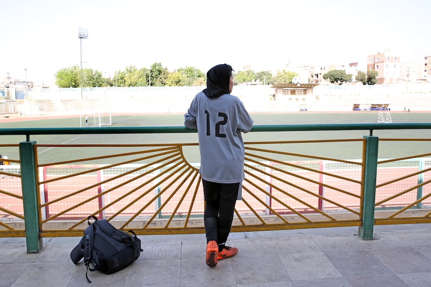 Soccer player looks at the field
