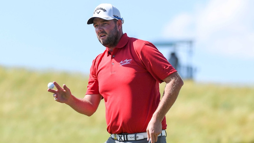 Australia's Marc Leishman reacts to a birdie on the ninth hole in round one of the 2017 US Open.