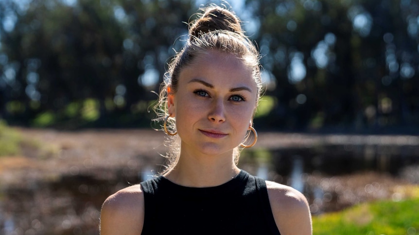 Young woman's portrait in afternoon sun.