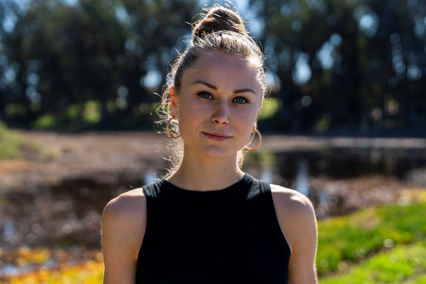 Young woman's portrait in afternoon sun.