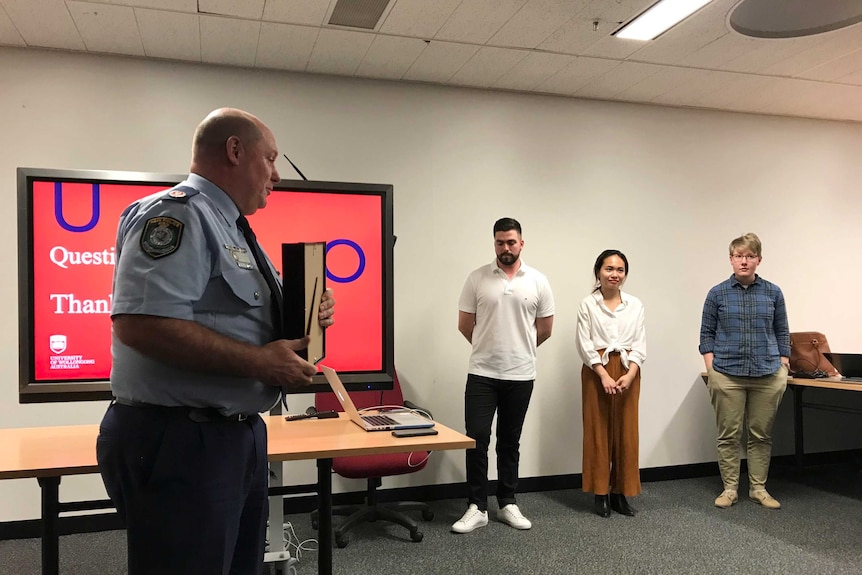 Police Commissioner presents UOW students with award