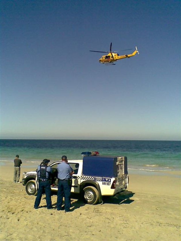 Police have confirmed a piece of wetsuit found at the beach belonged to Mr Guest.