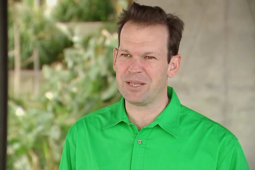 MCU of Resources Minister Matt Canavan in a green shirt