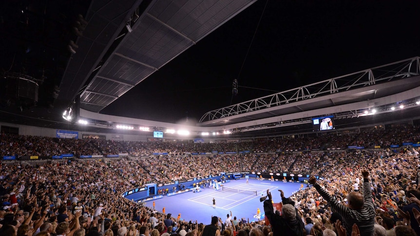 The crowd cheers at the Australian Open.