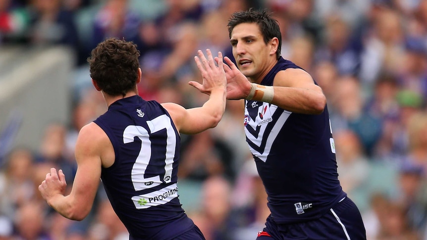 Matthew Pavlich celebrates a Dockers goal