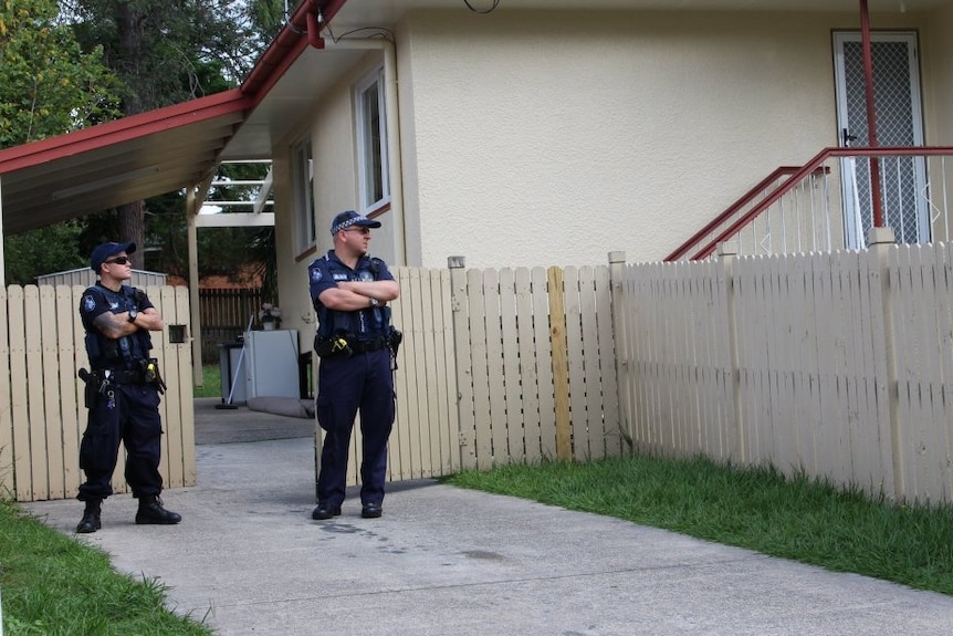 Police at a Woodridge house where a search is underway for a missing 22-month-old boy.
